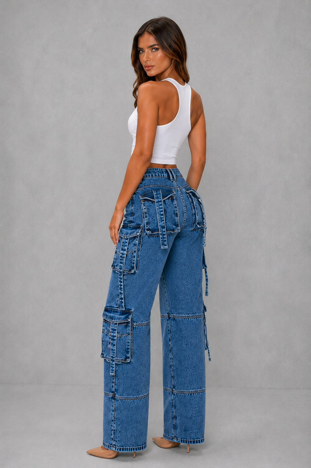 Womenโs oversized wide leg denim cargo pants with dark wash finish, distressed detailing and multiple utility pockets for casual Y2K streetwear.