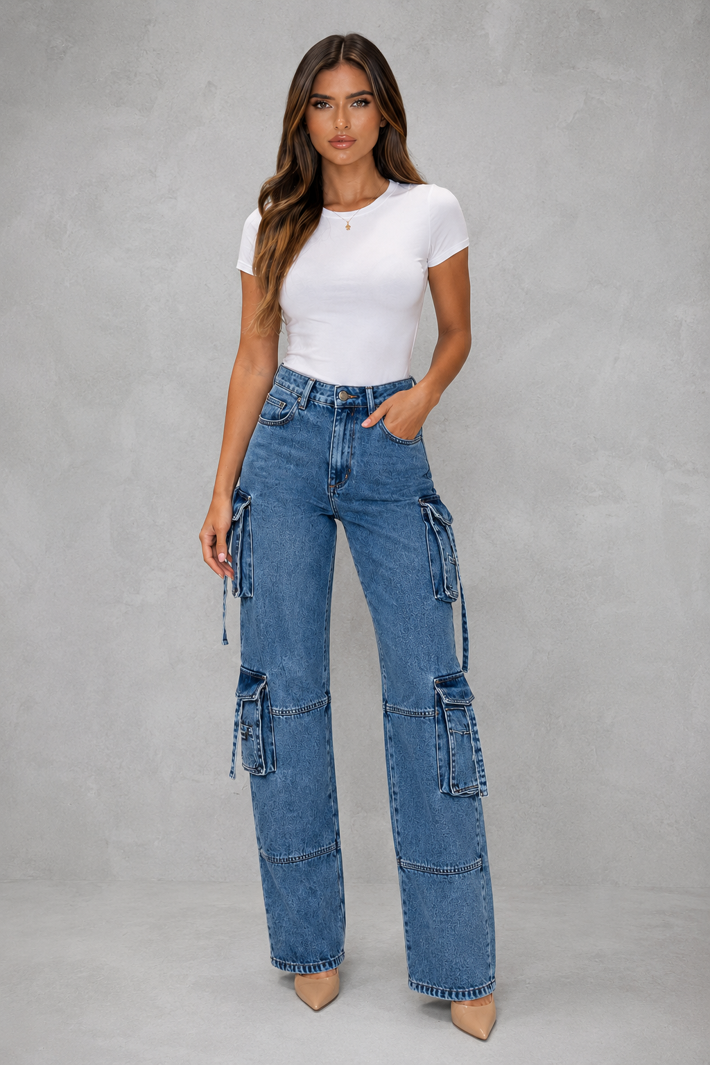 Womenโs oversized wide leg denim cargo pants with dark wash finish, distressed detailing and multiple utility pockets for casual Y2K streetwear.