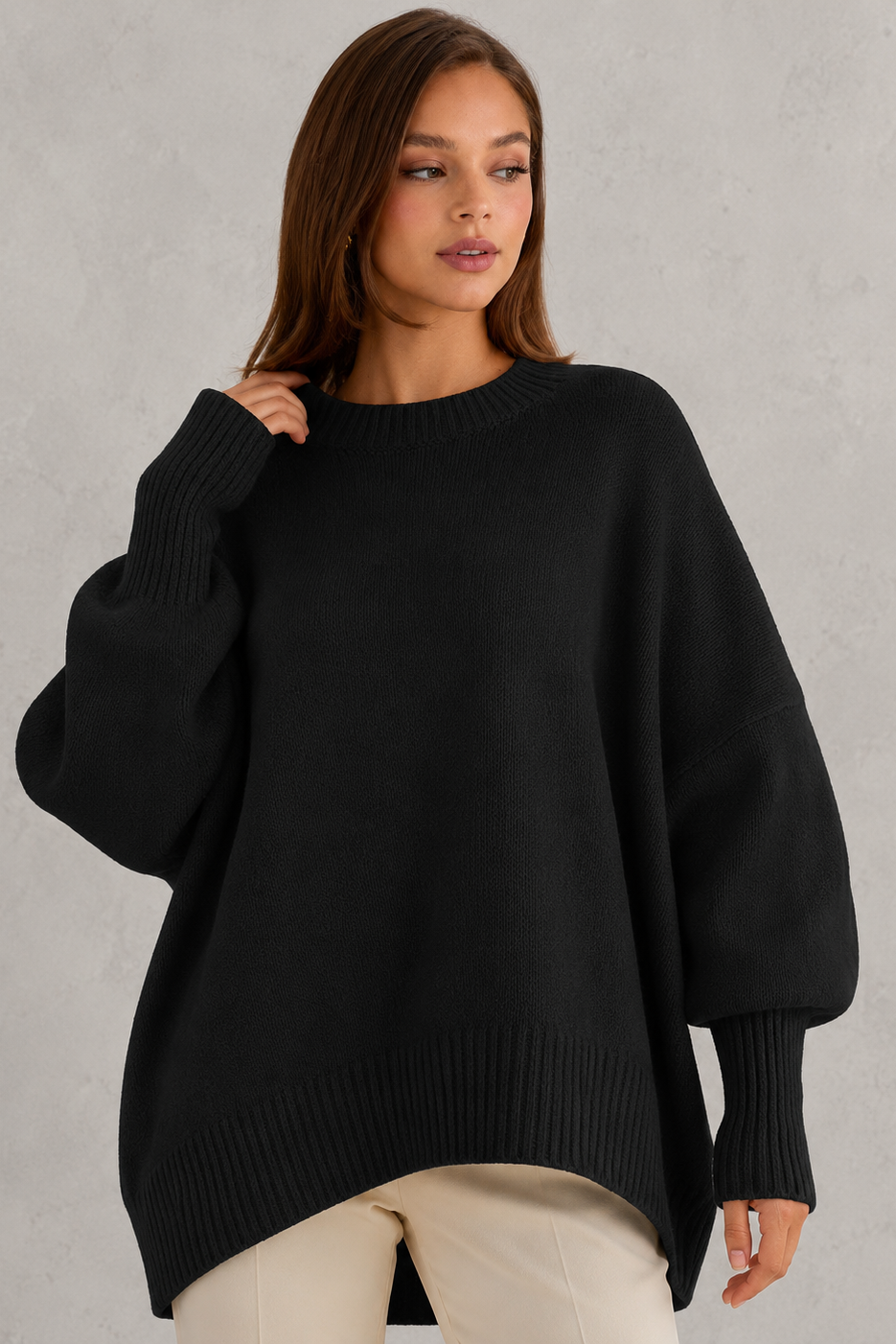 Women’s oversized wool blend sweater with asymmetrical hem, drop shoulders, and relaxed fit