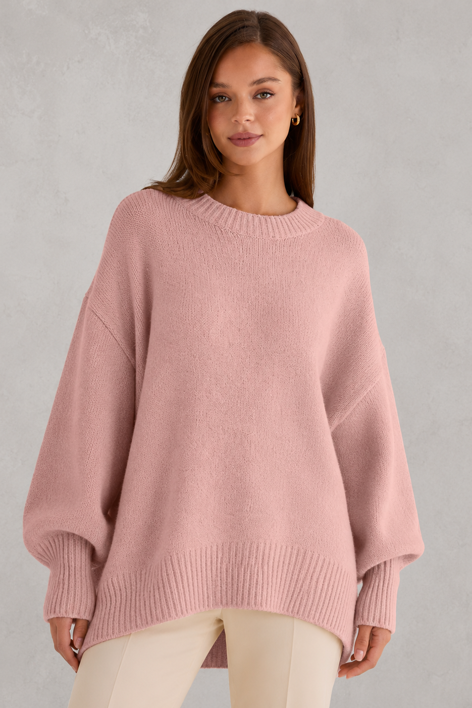 Women’s oversized wool blend sweater with asymmetrical hem, drop shoulders, and relaxed fit