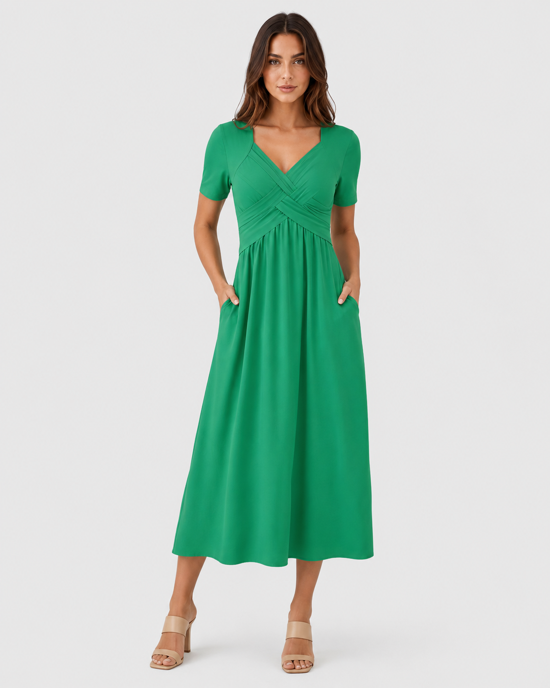 Women's relaxed-fit midi dress made from lightweight polyester fabric. Designed with a clean, versatile silhouette that falls below the knee, offering comfort and ease of movement for everyday wear. Suitable for casual outings or more polished occasions. Machine washable and true to size with light shaping through the fit.