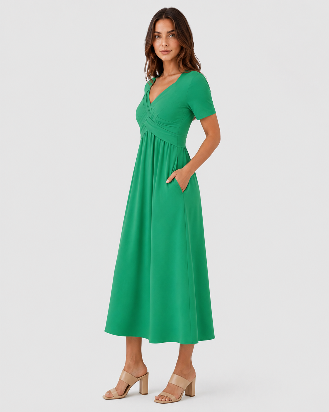 Women's relaxed-fit midi dress made from lightweight polyester fabric. Designed with a clean, versatile silhouette that falls below the knee, offering comfort and ease of movement for everyday wear. Suitable for casual outings or more polished occasions. Machine washable and true to size with light shaping through the fit.