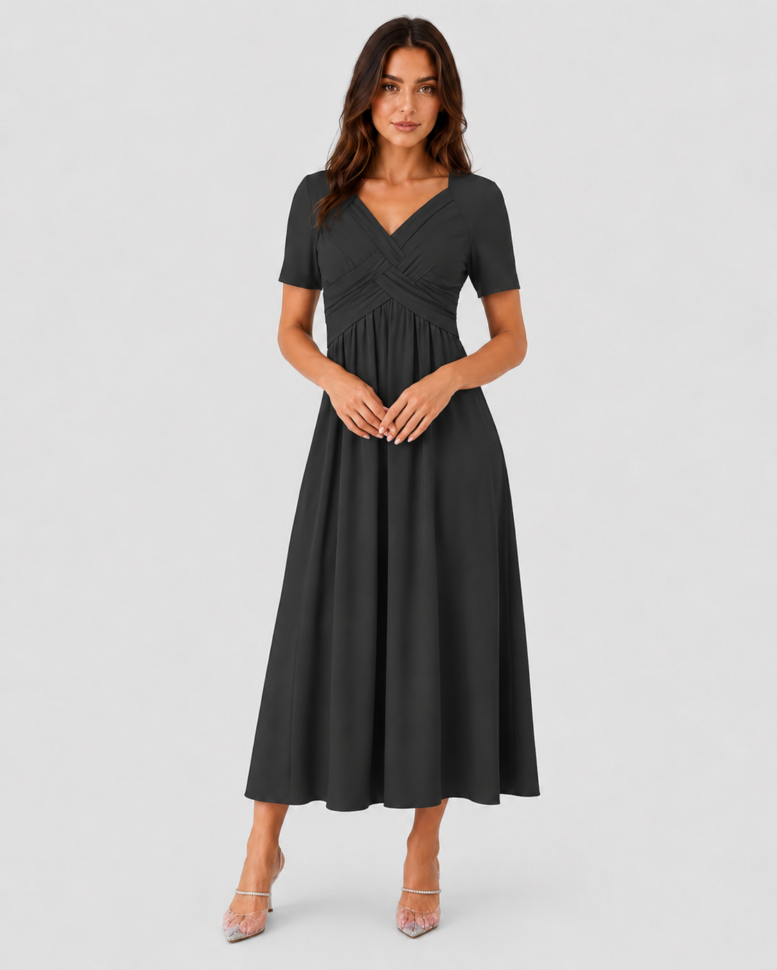 Women's relaxed-fit midi dress made from lightweight polyester fabric. Designed with a clean, versatile silhouette that falls below the knee, offering comfort and ease of movement for everyday wear. Suitable for casual outings or more polished occasions. Machine washable and true to size with light shaping through the fit.