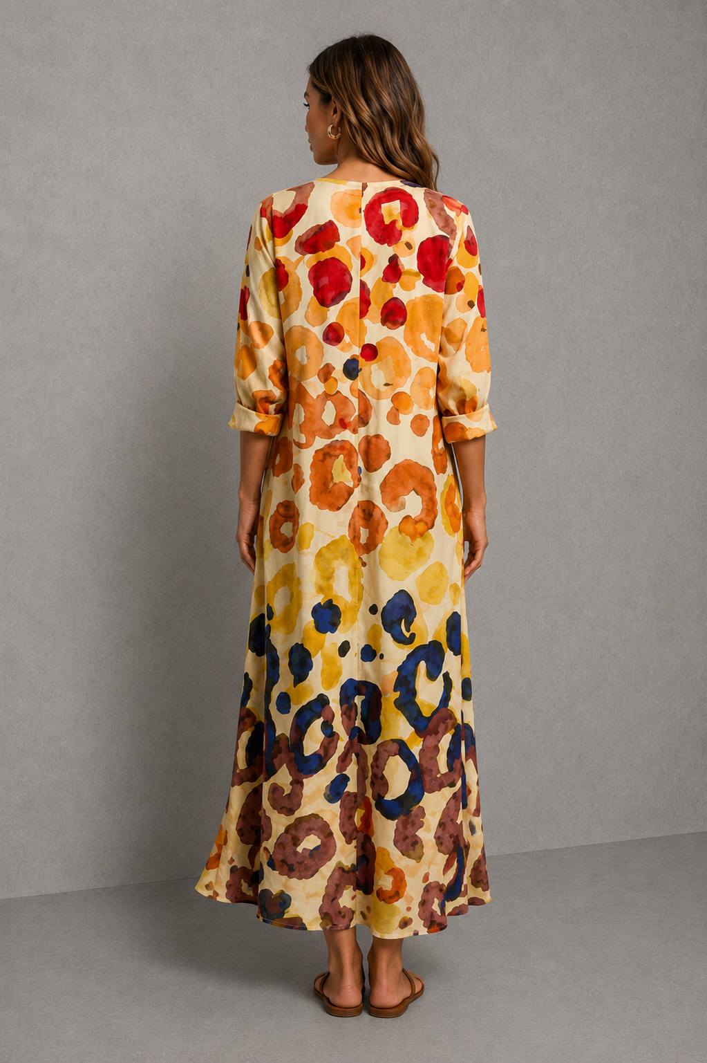 Womenโs printed shirt dress with button-front design, soft collar, relaxed flowing fit and artistic all-over print.