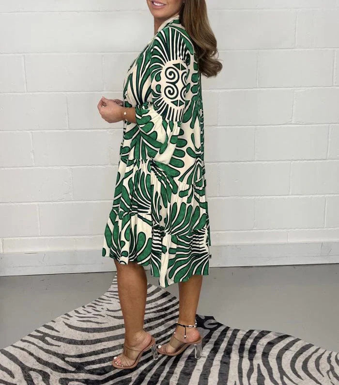 Women’s printed V-neck midi dress made from lightweight polyester blend fabric