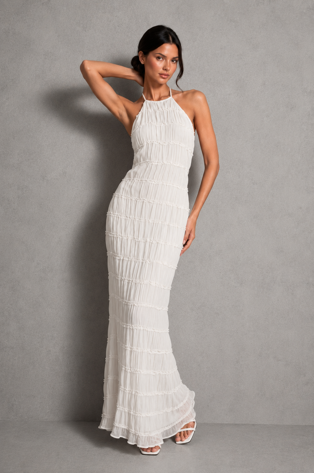 Women's ruched smocked maxi dress with a stretchy bodice, adjustable tie detail and flowing silhouette, perfect for holidays, garden parties, brunch and summer occasions.
