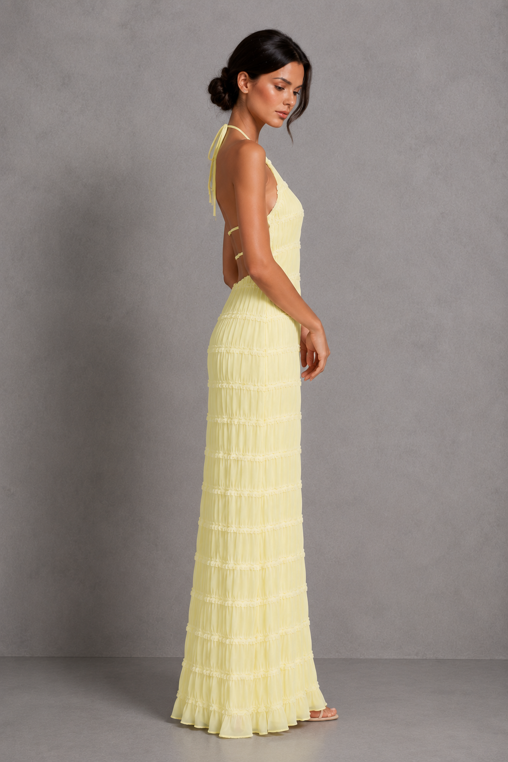 Women's ruched smocked maxi dress with a stretchy bodice, adjustable tie detail and flowing silhouette, perfect for holidays, garden parties, brunch and summer occasions.