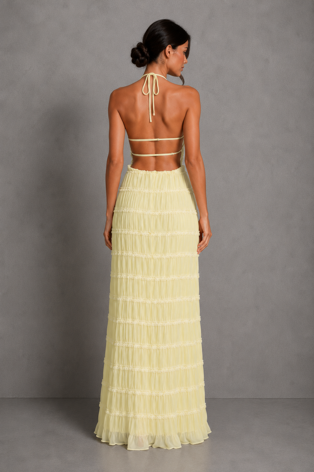 Women's ruched smocked maxi dress with a stretchy bodice, adjustable tie detail and flowing silhouette, perfect for holidays, garden parties, brunch and summer occasions.