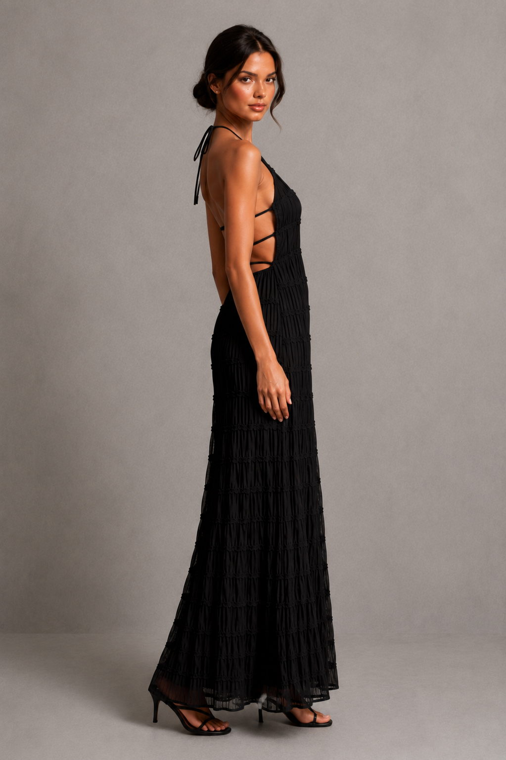 Women's ruched smocked maxi dress with a stretchy bodice, adjustable tie detail and flowing silhouette, perfect for holidays, garden parties, brunch and summer occasions.