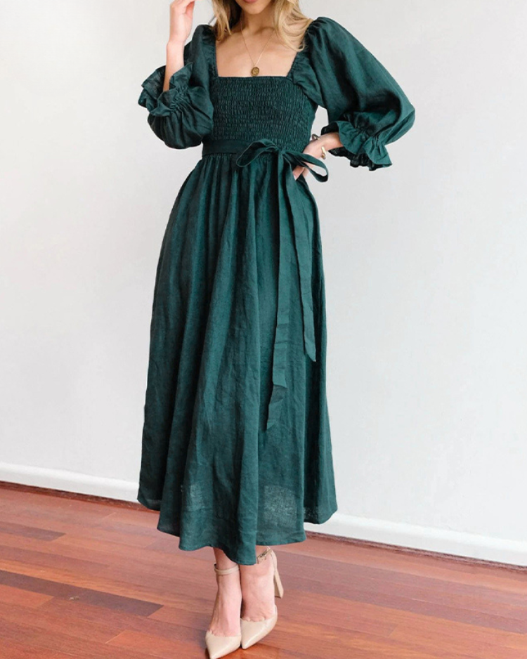 Women wearing midi dress with French ruffle sleeves and side cutout detail in slim fit silhouette