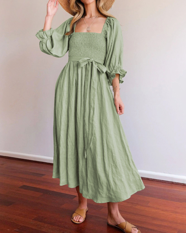 Women wearing midi dress with French ruffle sleeves and side cutout detail in slim fit silhouette