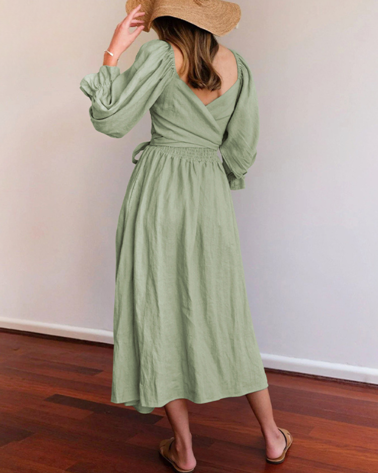 Women wearing midi dress with French ruffle sleeves and side cutout detail in slim fit silhouette