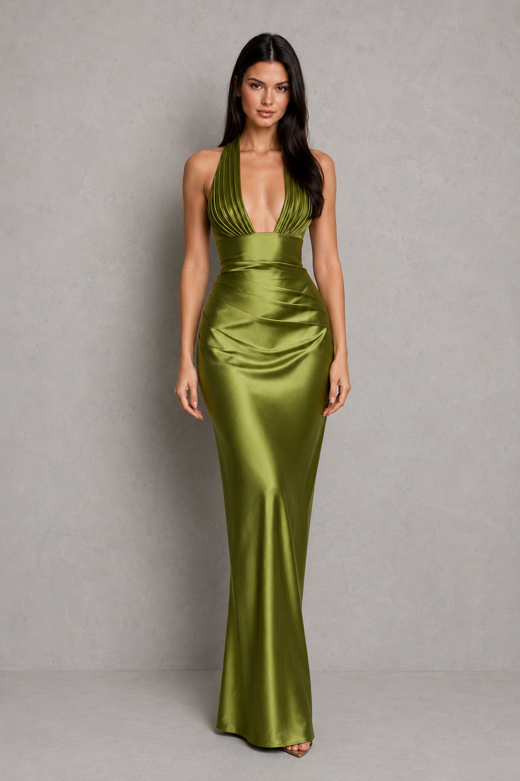 Women's satin halter maxi dress with a plunge neckline, sculptural pleated cups, asymmetric pleated bodice, and flowing bias-cut skirt. Features an internal corset bodice and adjustable lace-up back for a flattering, elegant silhouette ideal for evening events, formal occasions, and special celebrations.