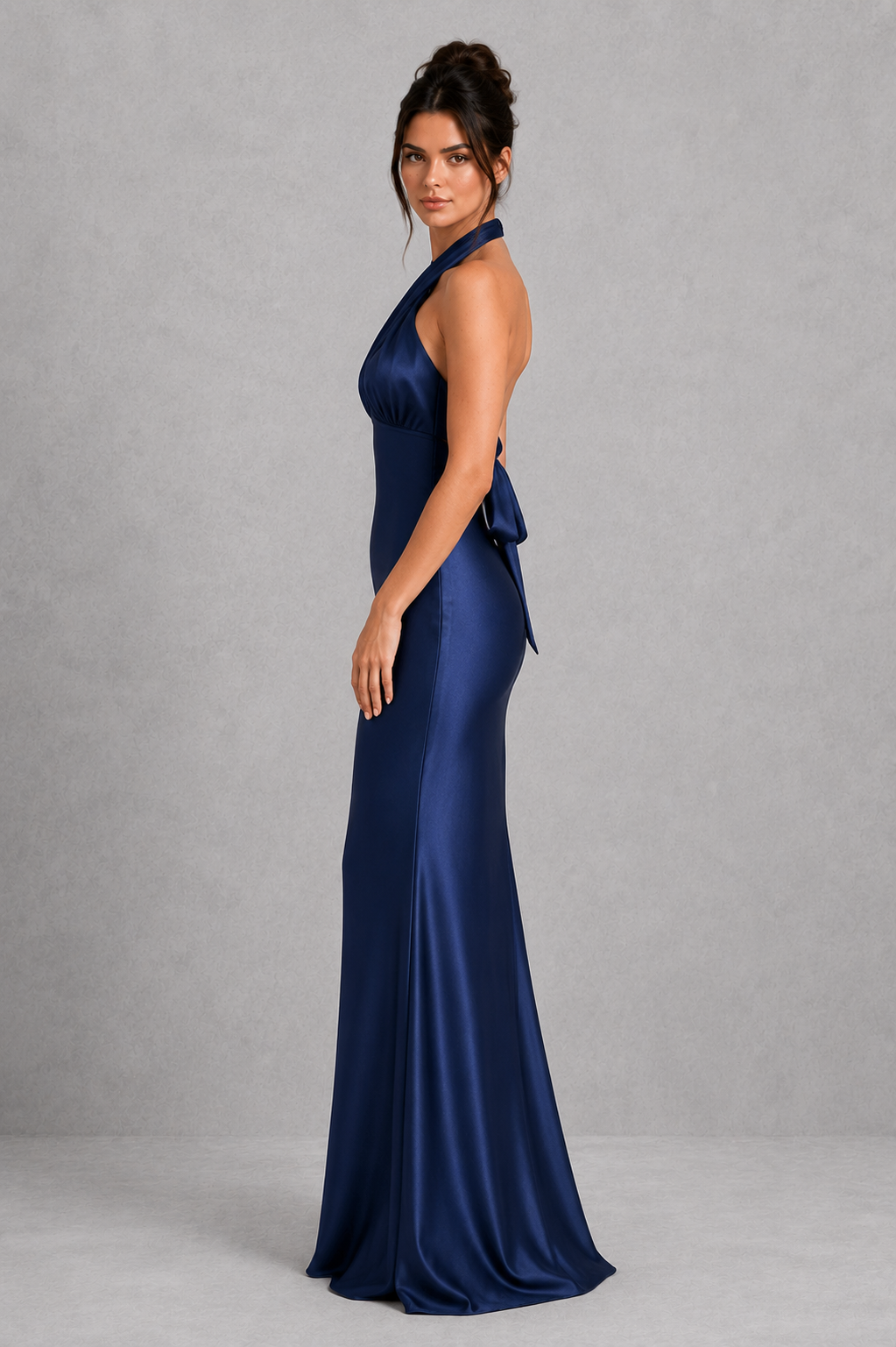 Elegant women's satin maxi dress featuring a high neckline, open back with adjustable tie, and full-length flowing skirt for formal occasions.