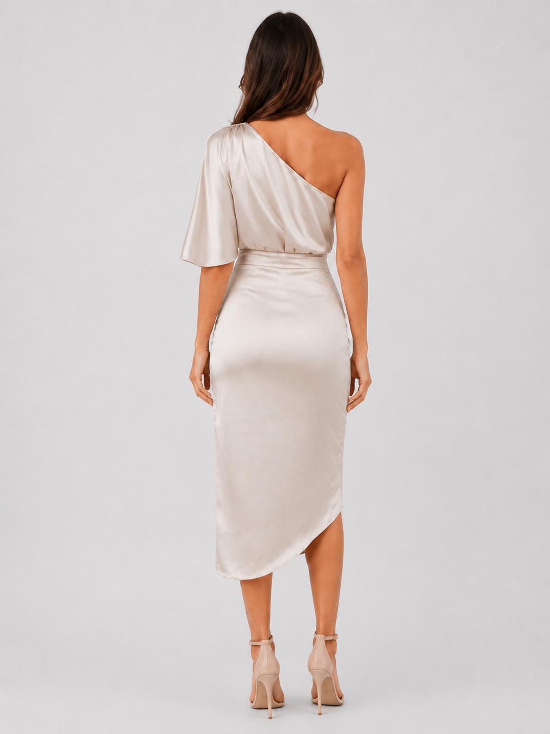 Womenโs satin midi one-shoulder evening dress featuring a smooth satin finish, elegant draped silhouette, and relaxed fit, ideal for evening events and special occasions.