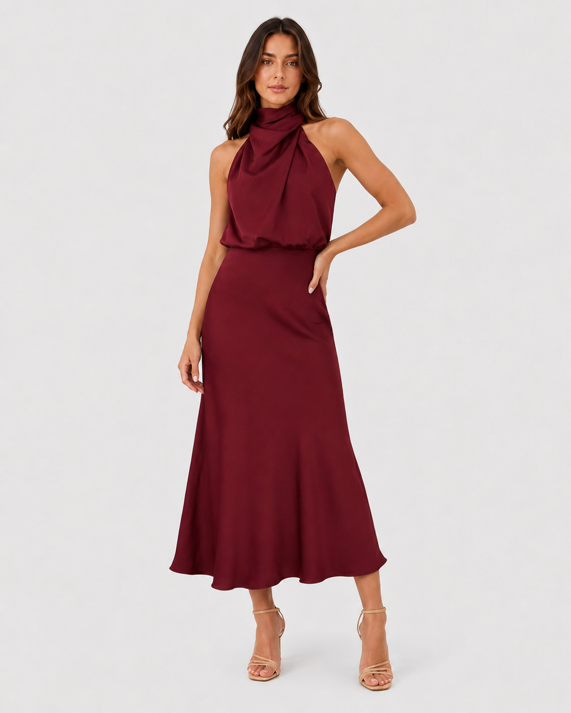 Womenโs satin one-shoulder midi dress featuring a side slit, smooth fabric, and flowing silhouette for an elegant and modern occasion-ready look.
