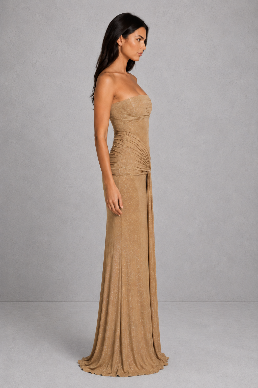Women's strapless glitter maxi dress with ruched waist detail, fitted bodice, semi-sheer mesh bodice panel, fit-and-flare skirt, and shimmering finish for evening parties, formal events, and special occasions.