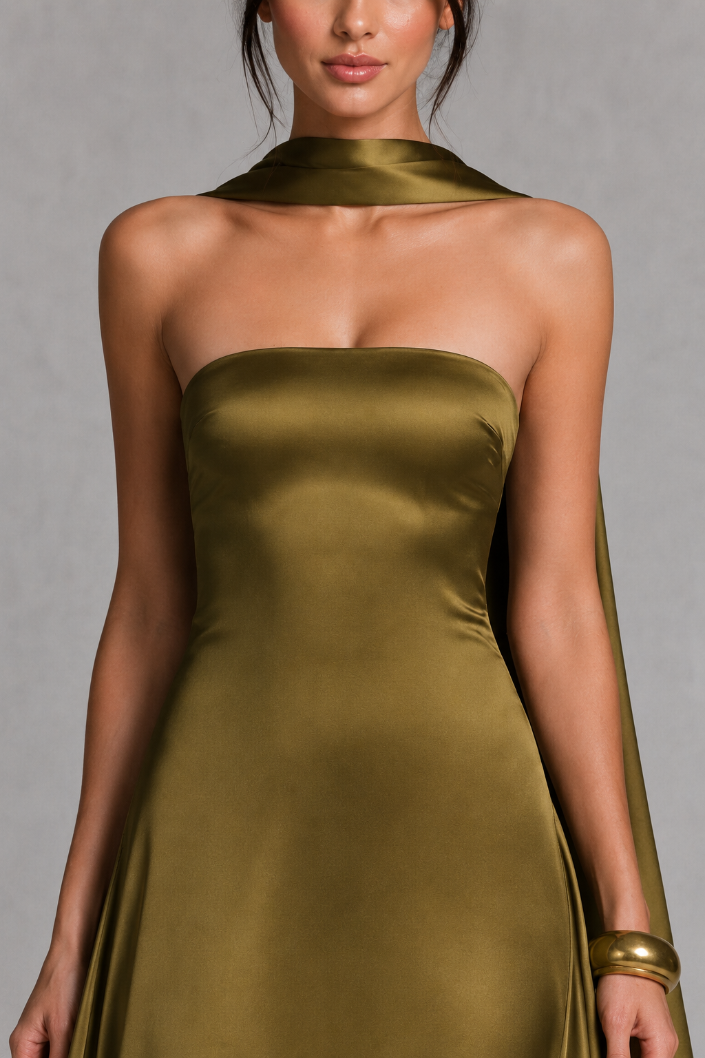 Women's strapless satin maxi dress with a straight neckline, fitted bodice, lace-up back, flowing A-line skirt, and matching satin scarf, ideal for evening events, weddings, and formal occasions.