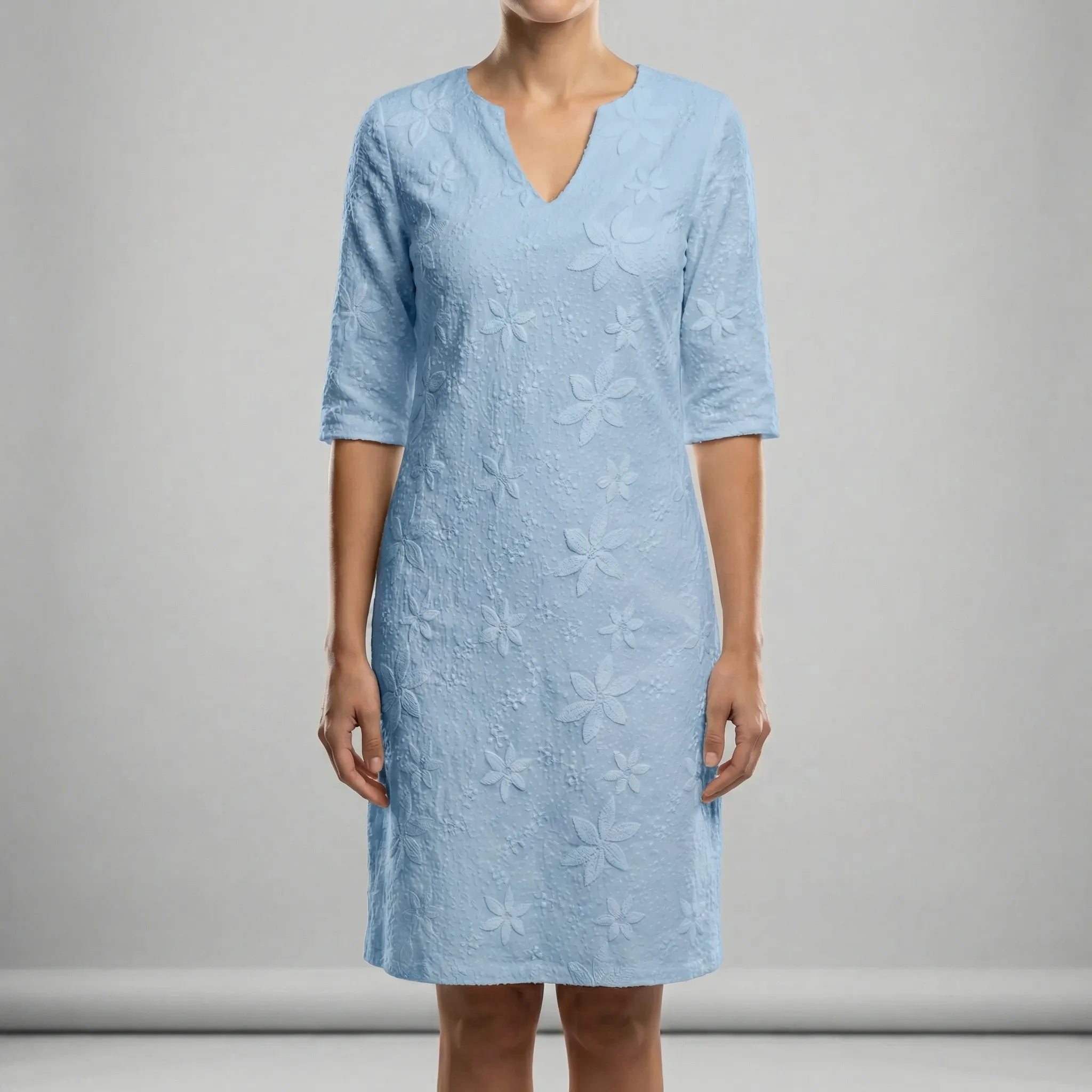 Women’s summer dress with V-neck, relaxed fit, and soft flowing drape