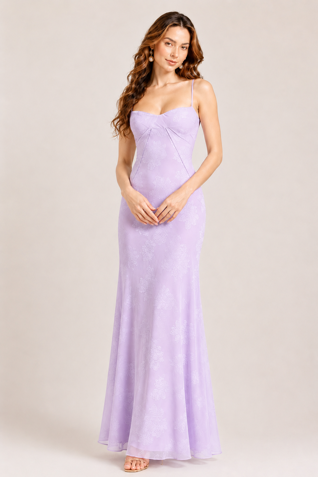 Woman wearing an elegant sweetheart neckline maxi dress with a fitted waist and flowing floor-length skirt, creating a timeless feminine silhouette ideal for weddings, parties, holidays, and special occasions.