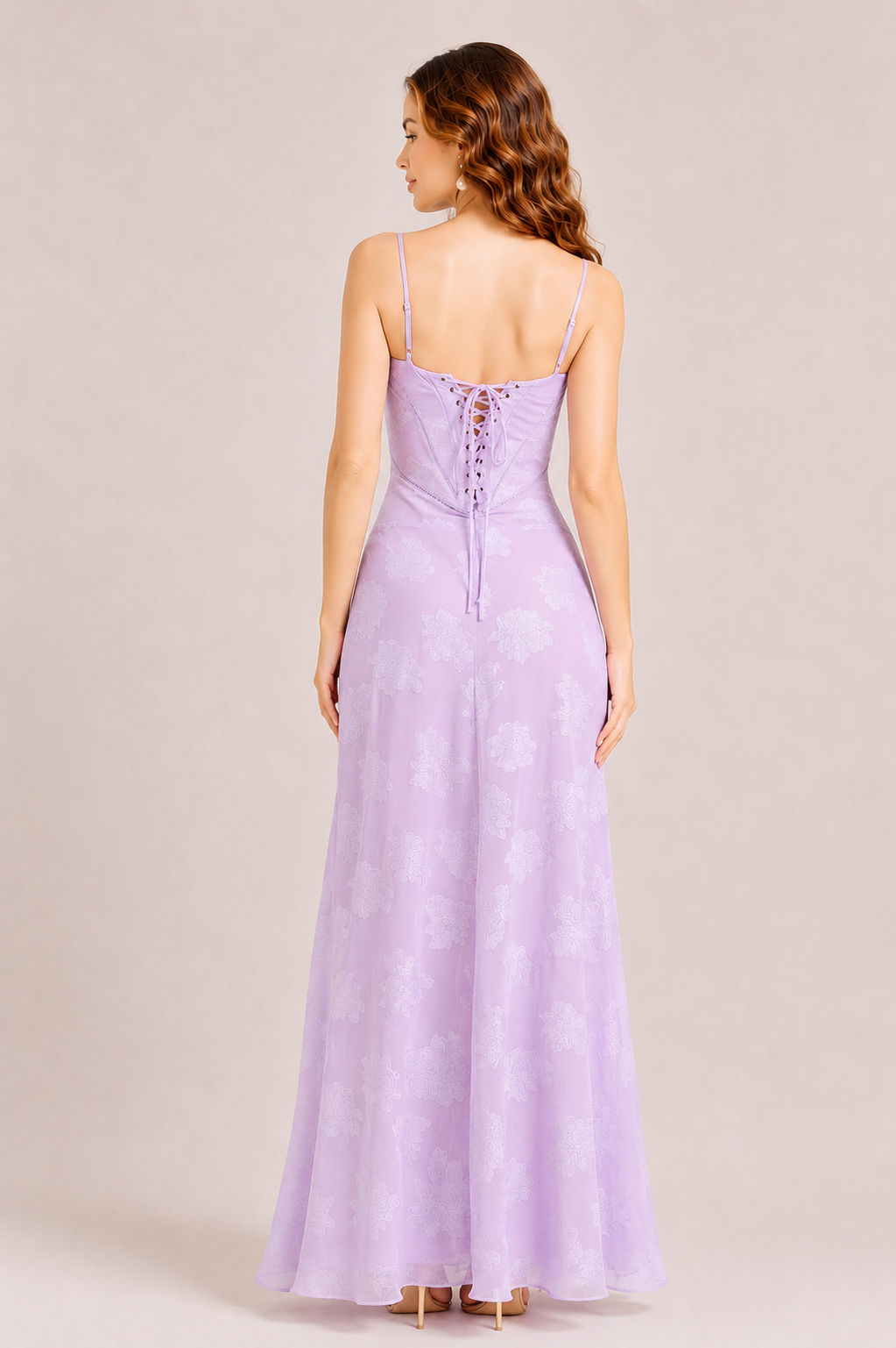 Woman wearing an elegant sweetheart neckline maxi dress with a fitted waist and flowing floor-length skirt, creating a timeless feminine silhouette ideal for weddings, parties, holidays, and special occasions.