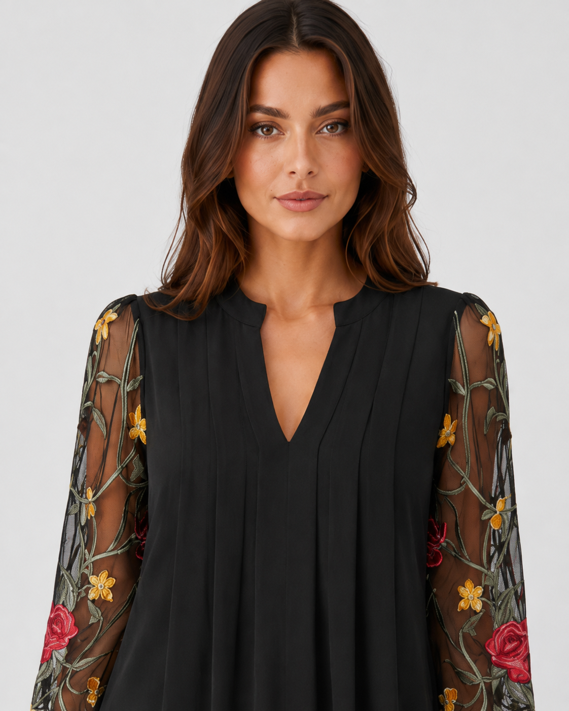 Women's floral mini dress with a V-neckline, sheer long sleeves, lightweight fabric, and a relaxed fit, ideal for casual wear, events, and evening outings.