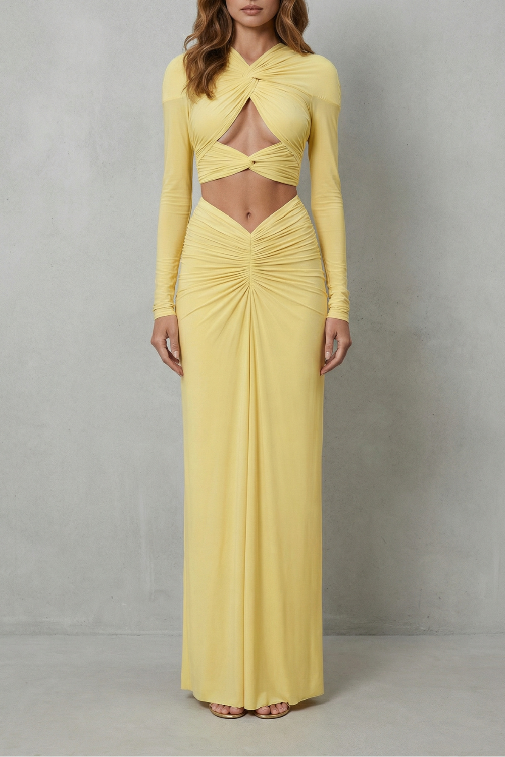 Women's long-sleeve cutout crop top and ruched maxi skirt set, front view