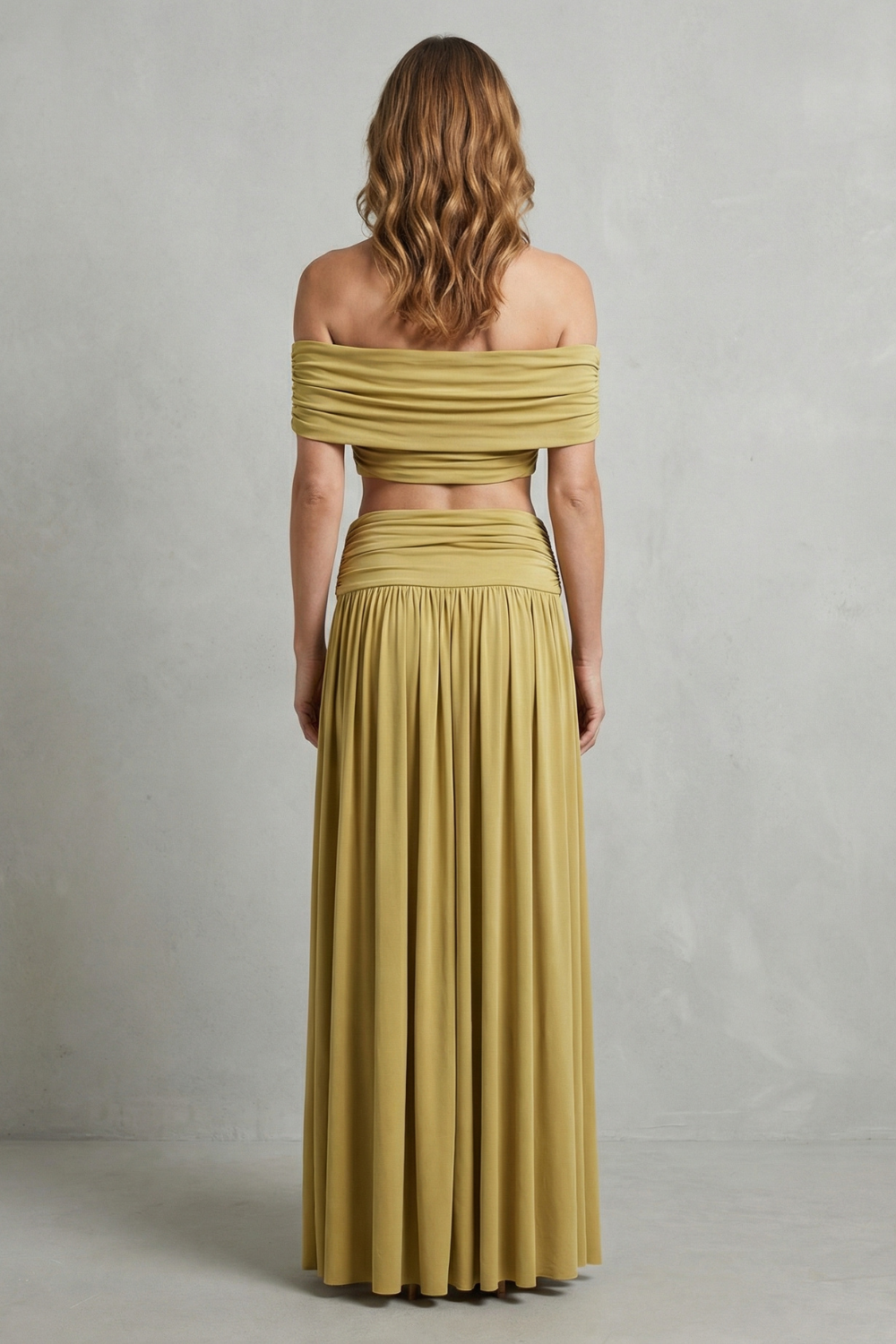 Detail close-up of the center ruching and high-waisted waistband