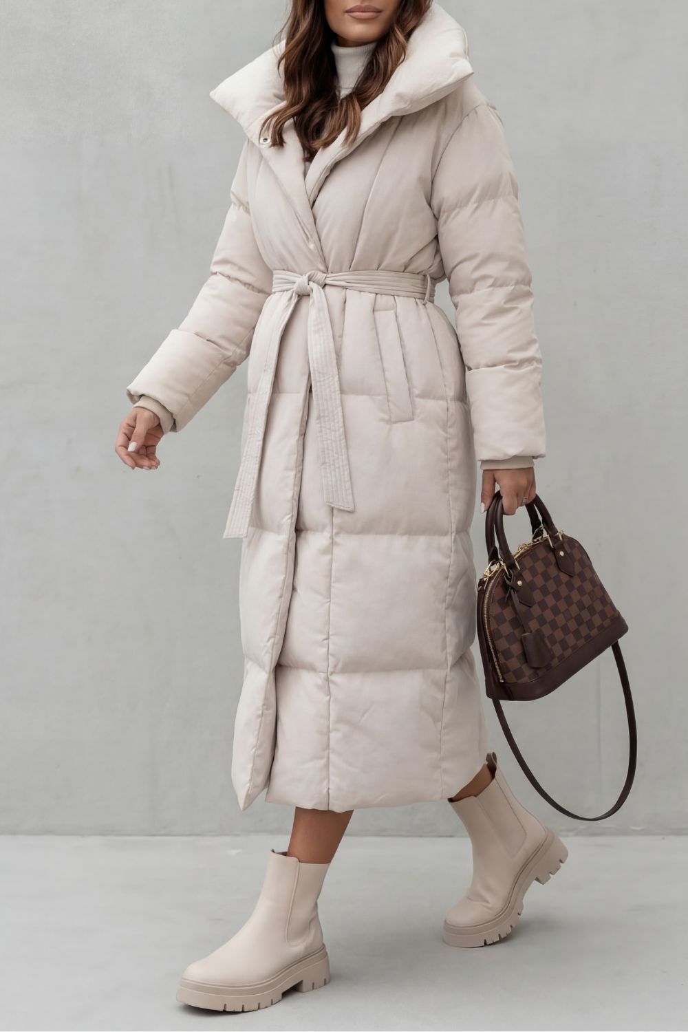 Women's Belted Long Puffer Coat with a Stylish Silhouette - Frescetta
