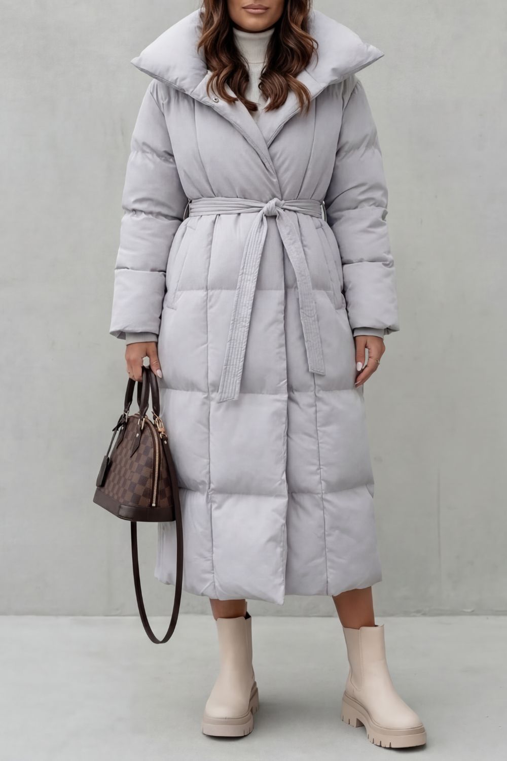 Women's Belted Long Puffer Coat with a Stylish Silhouette - Frescetta