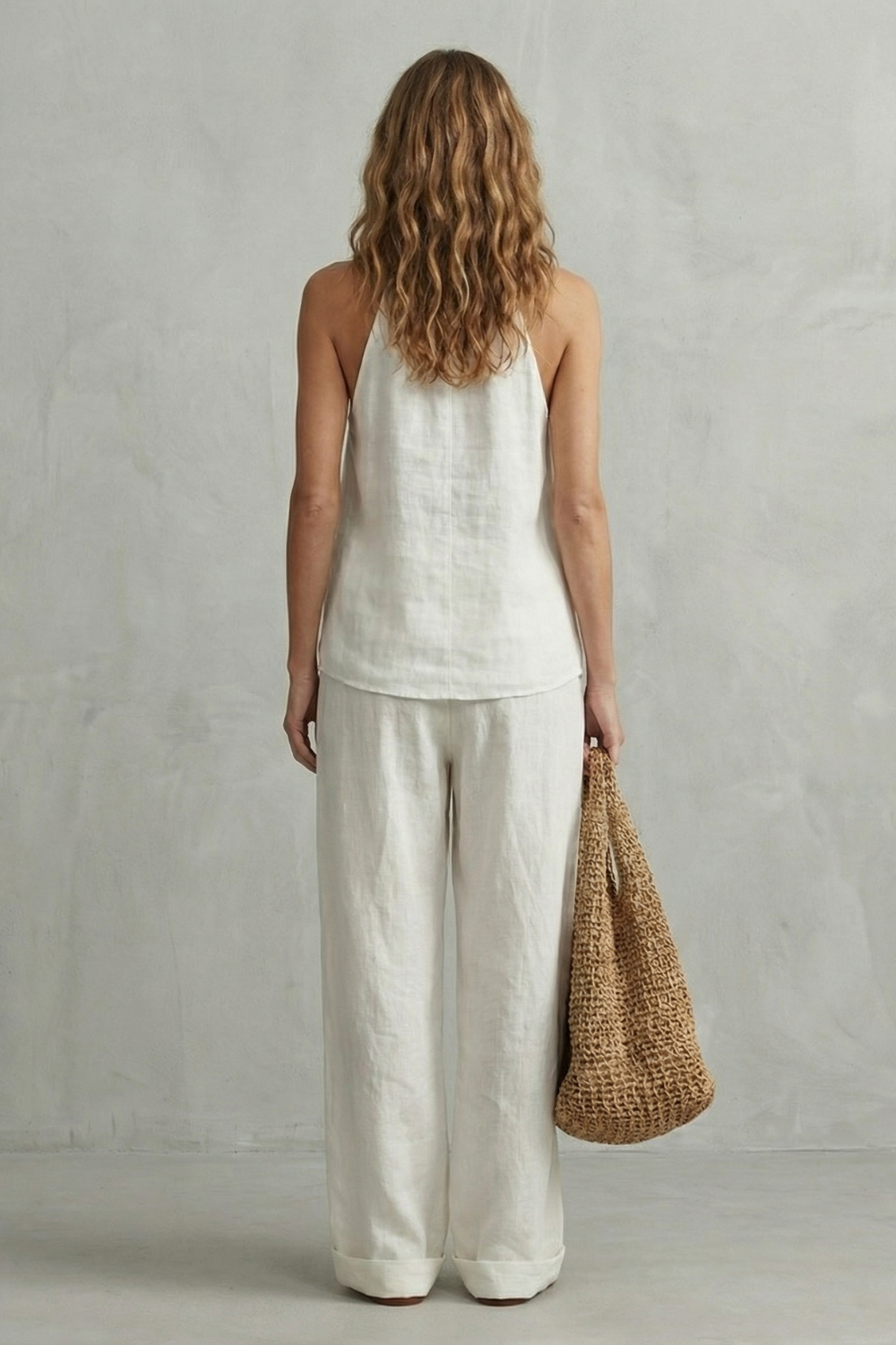 White colorway of the halter top and wide-leg pants set, full-length view