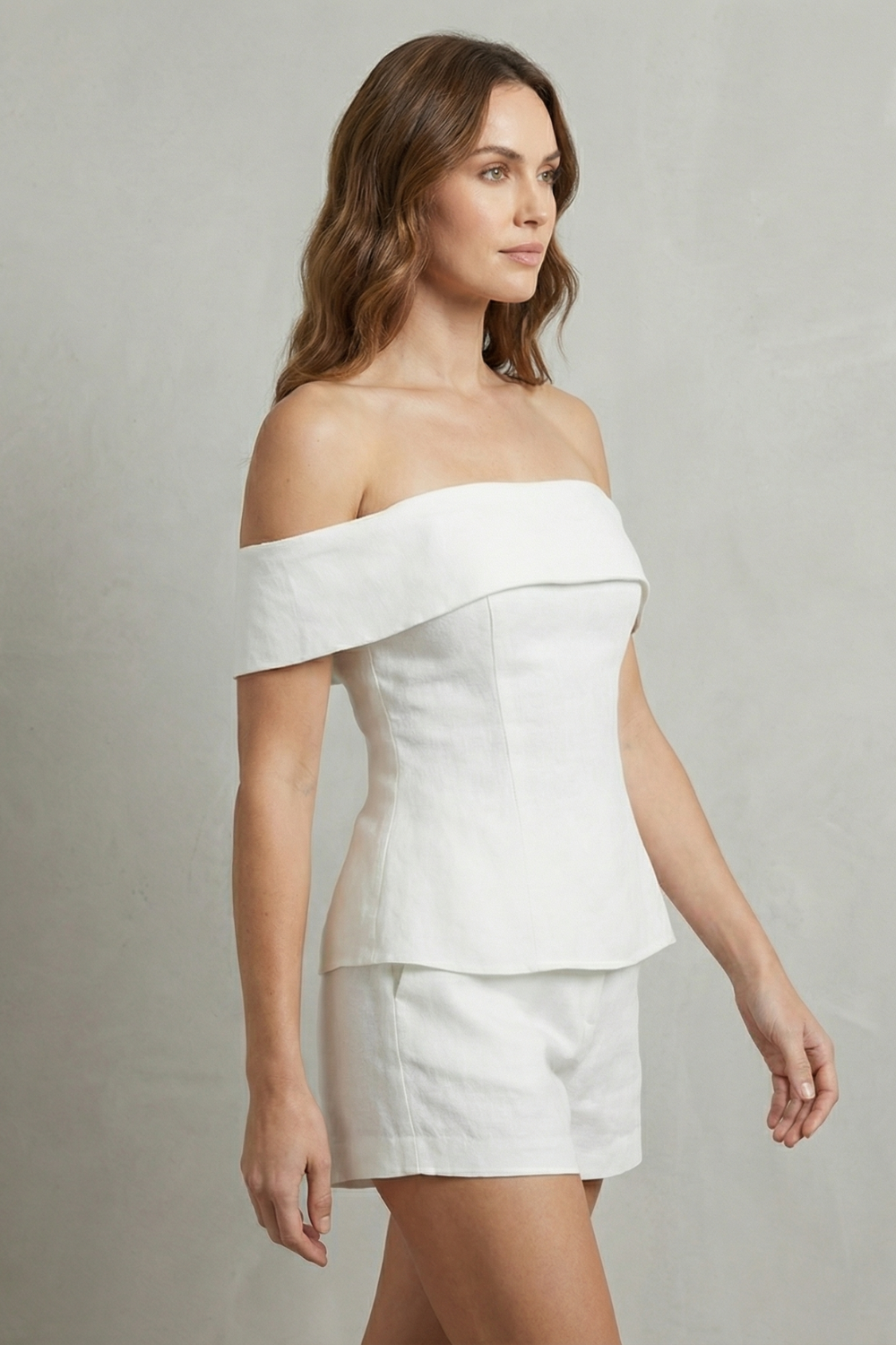 Back view of the peplum top and tailored shorts two-piece set