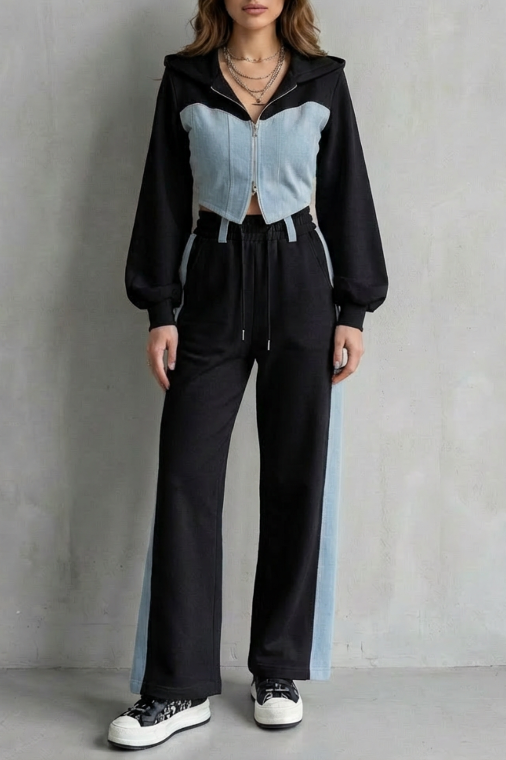 Black colorway, full-length view of the denim splice hoodie set