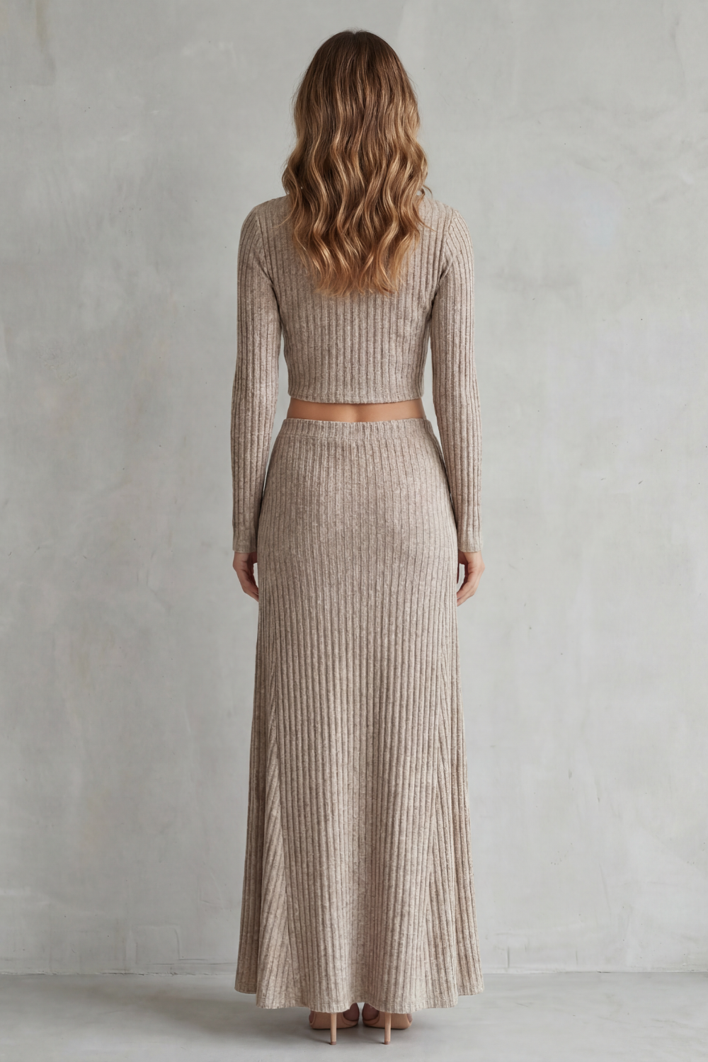 Detail close-up of the boat neckline and ribbed knit texture