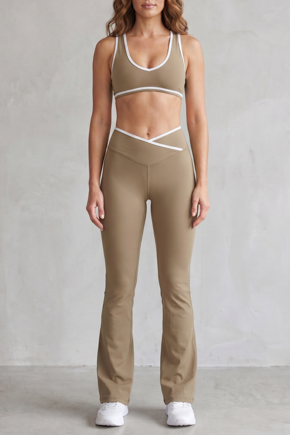 Gray colorway of the sports bra and flared leggings set, full-length view