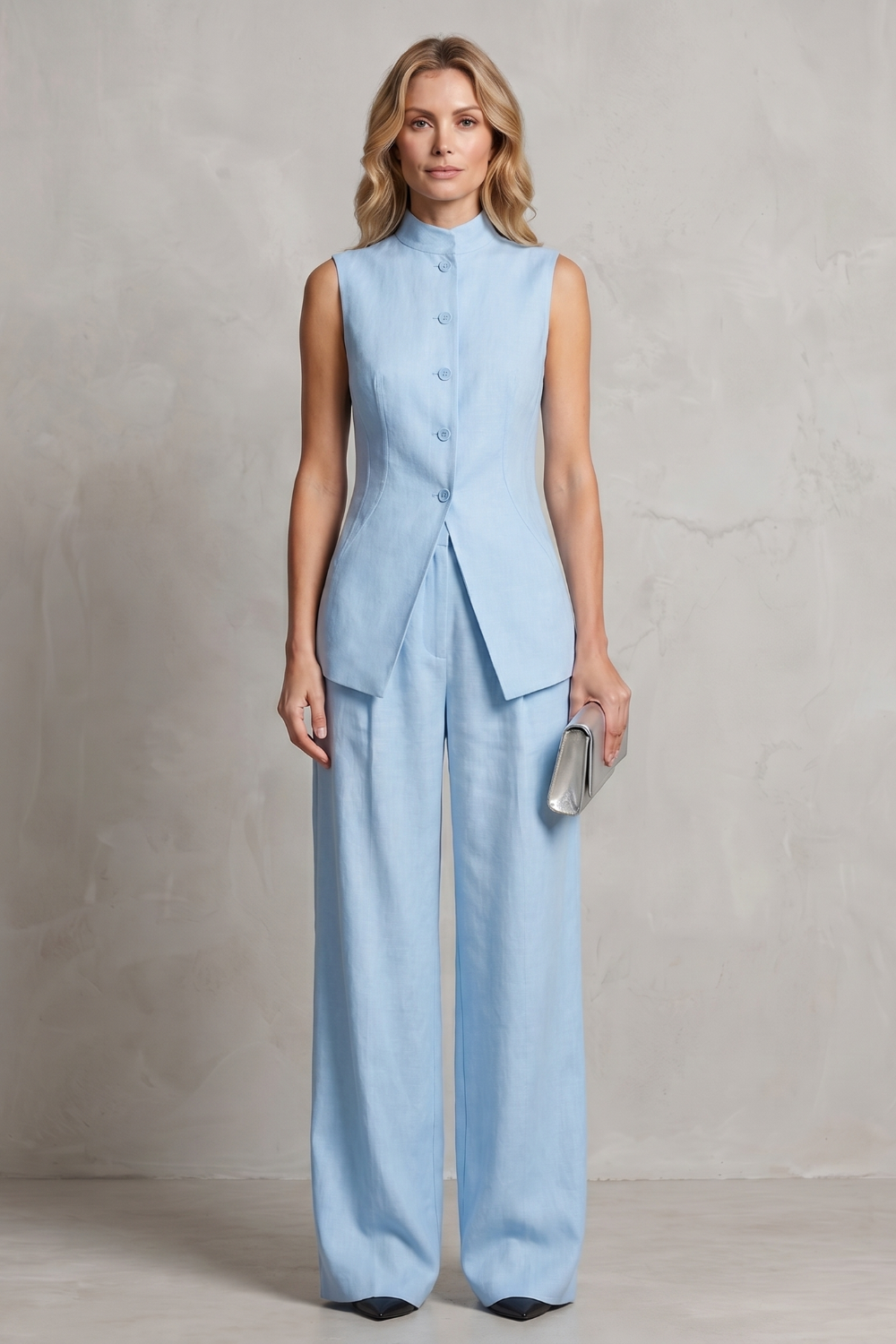Detail of the wide-leg pant hem and fabric drape