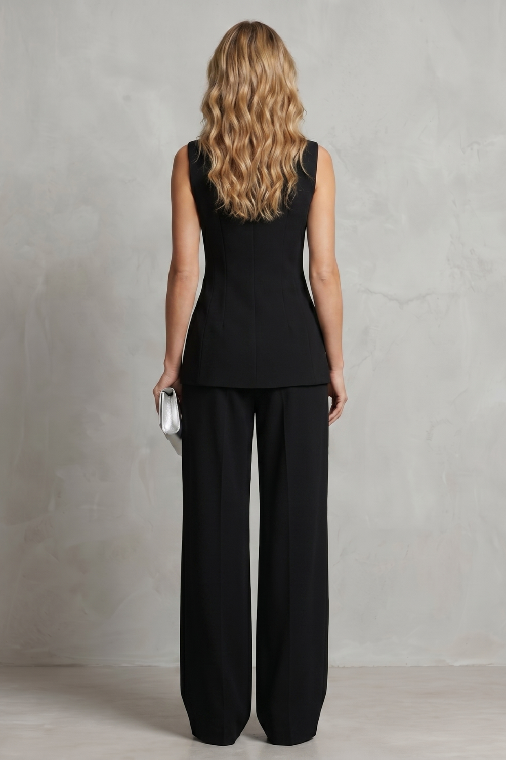 Detail close-up of the draped asymmetric front on the sleeveless top