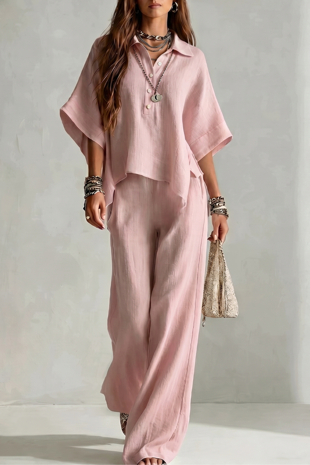 Wide-leg pants detail showing the airy drape of the fabric