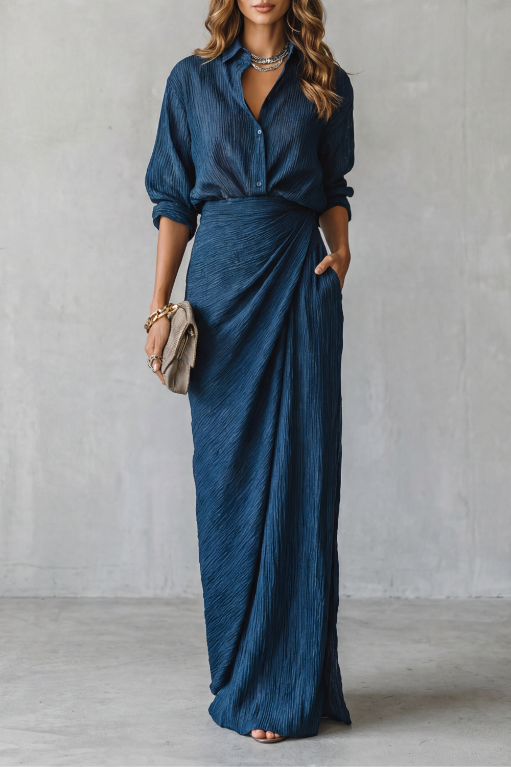 Women's pleated button-up blouse and maxi skirt set, front view
