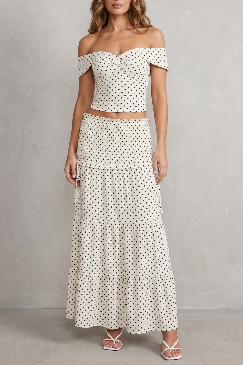 Women's off-shoulder polka dot top and ruched maxi skirt set, front view