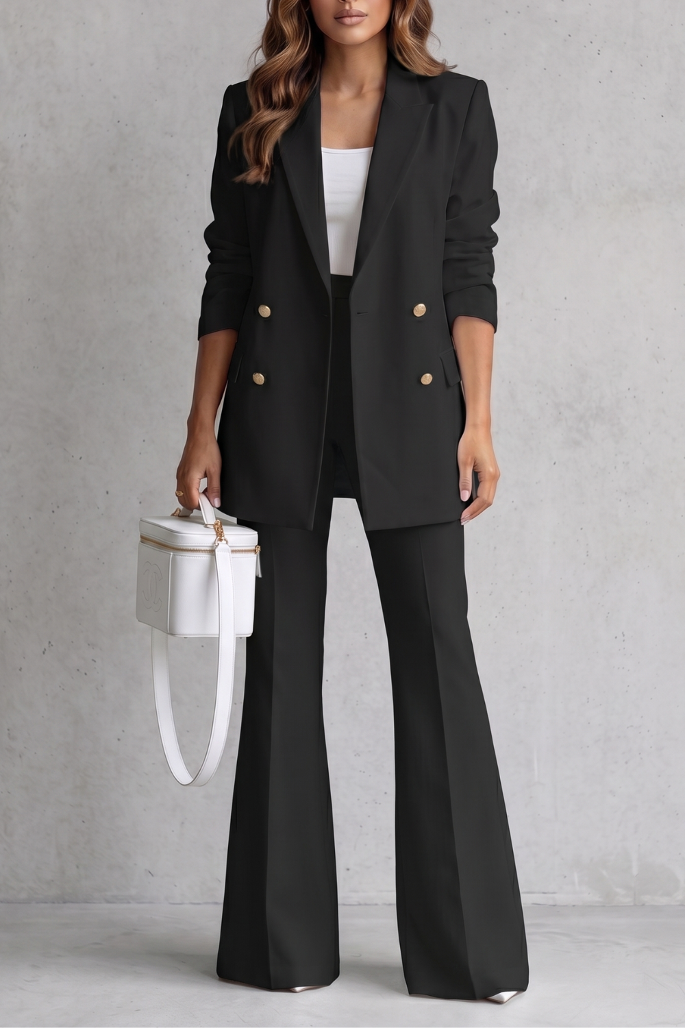 Close-up of the lapel and structured shoulder on the tailored blazer