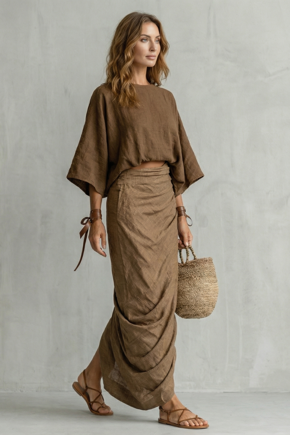 Detail close-up of the batwing sleeve volume and round neckline