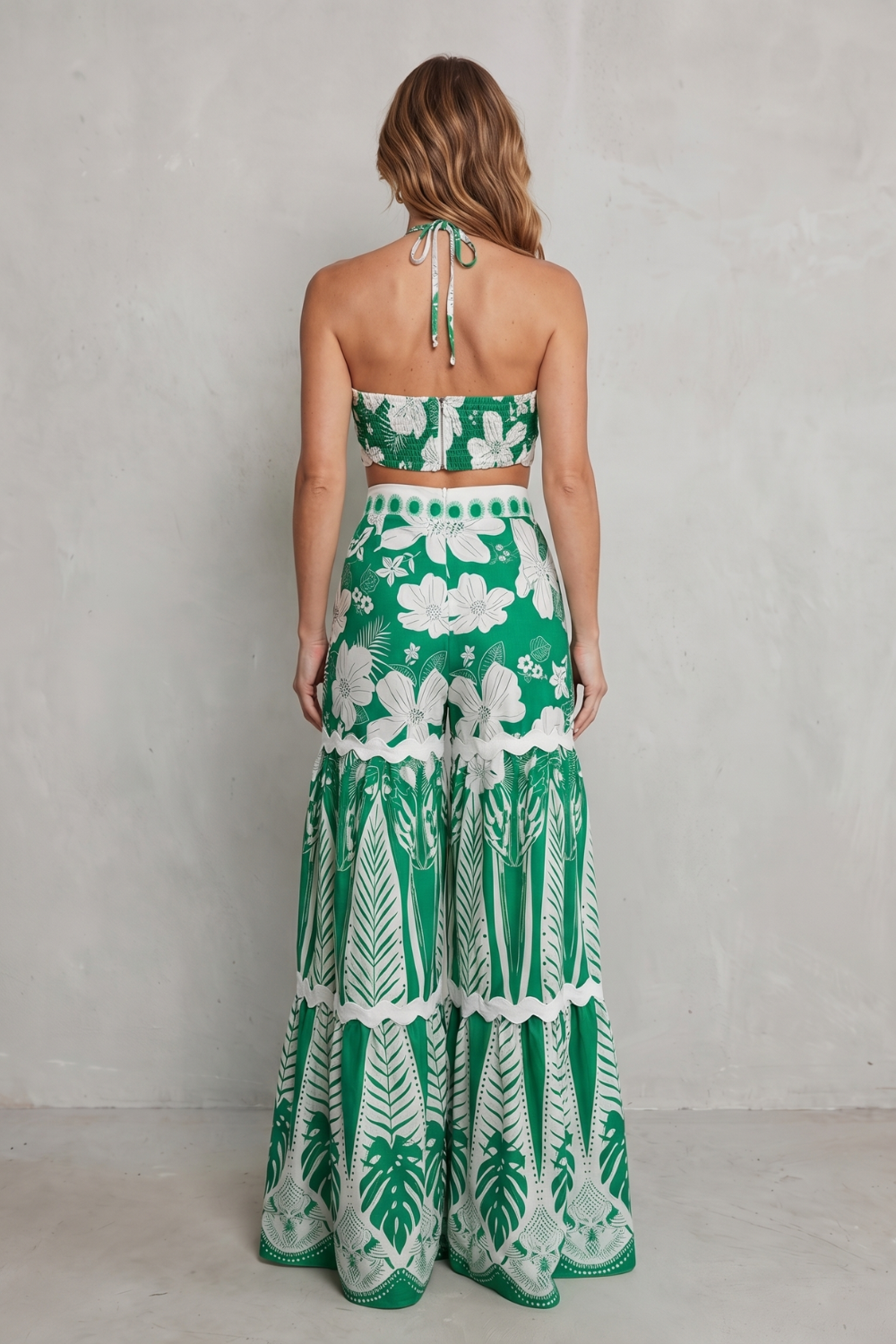 Green tropical print set styled with heeled sandals, full-length view