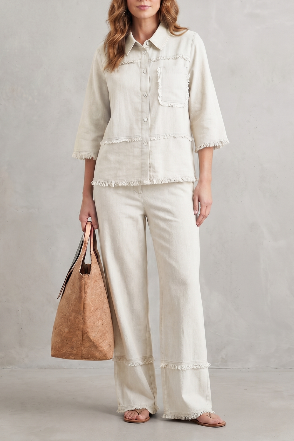 Linen blend pants set styled with woven sandals and a tote bag