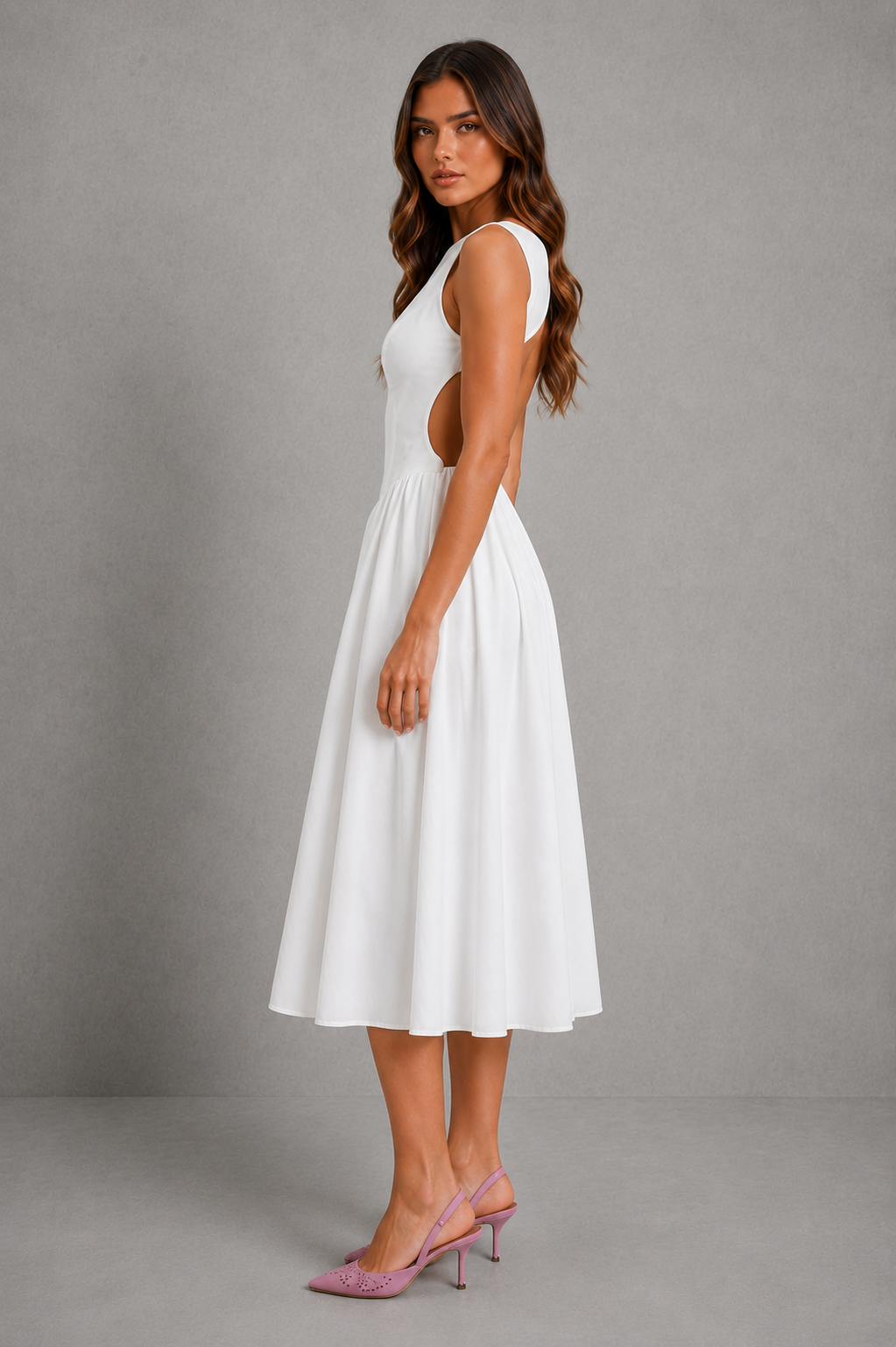 Women’s elegant open-back midi dress with sleeveless fitted bodice, round neckline and flowing A-line skirt for weddings and evening wear.