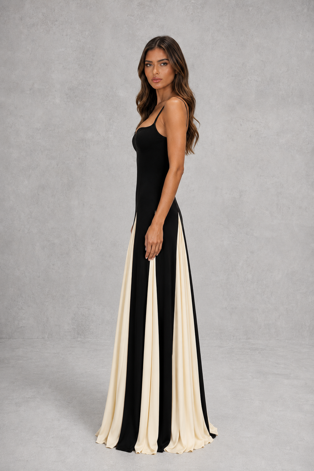 Women’s two-tone maxi dress with sculpted fitted bodice, adjustable shoulder straps and flowing contrast skirt for elegant occasion wear.