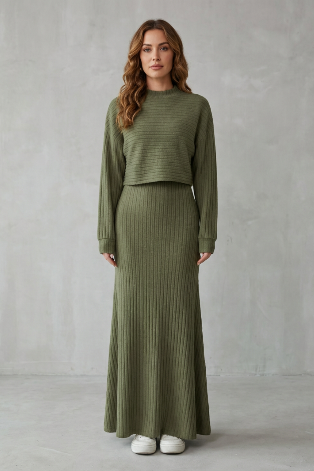 Side view of the Clara ribbed maxi dress layered with the cropped sweater