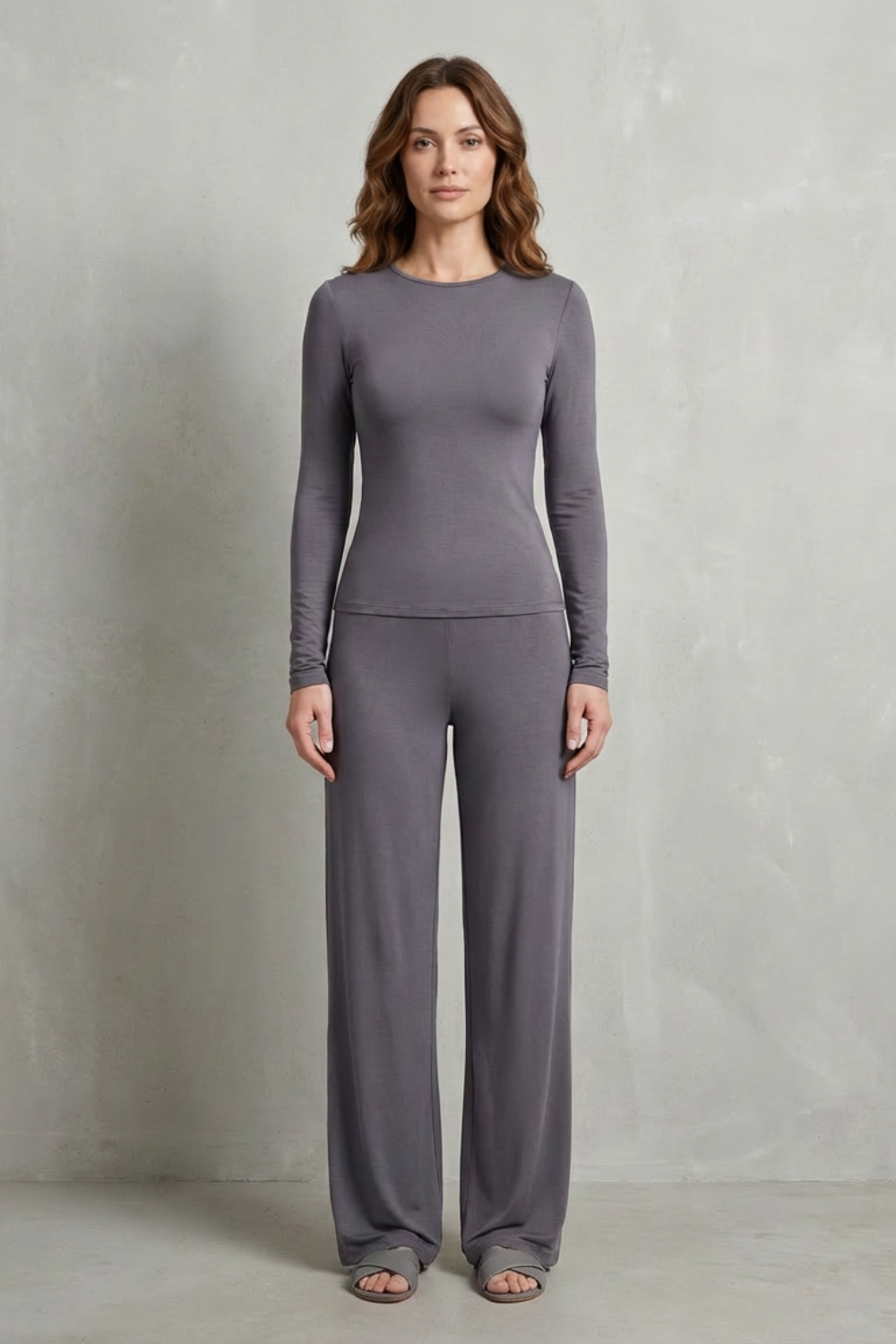 Side view of the fitted knit top and flowy wide-leg pants