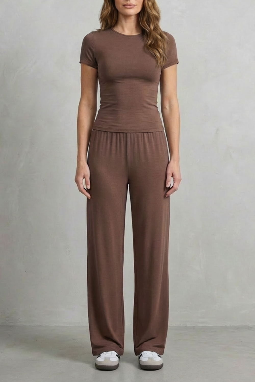 Close-up of the round neckline on the fitted knit top