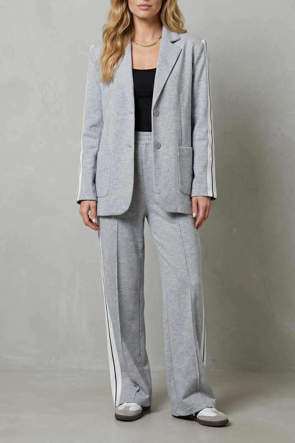 Women's sporty side-stripe blazer and pants suit set, front view